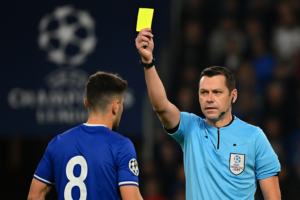 UEFA Liga šampiona 2026/27 novo pravilo o kartonima — featured slika za članak "UEFA Liga šampiona 2026/27: novo pravilo o kartonima menja rizik pred 2. kolo"